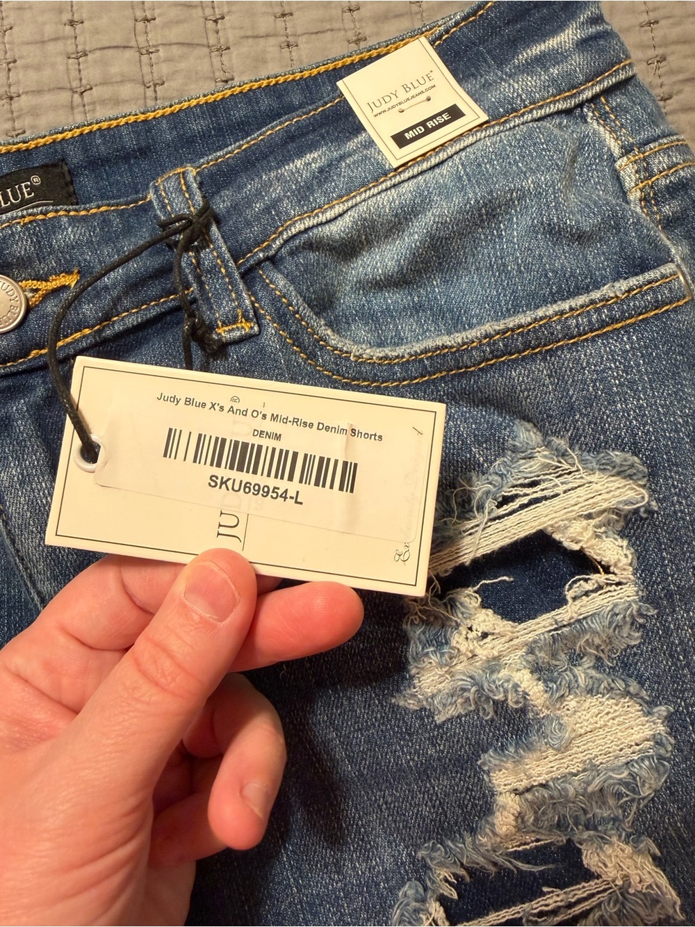 Judy Blue Distressed X’s and O’s Mid Rise Denim Shorts - Picture 2 of 3